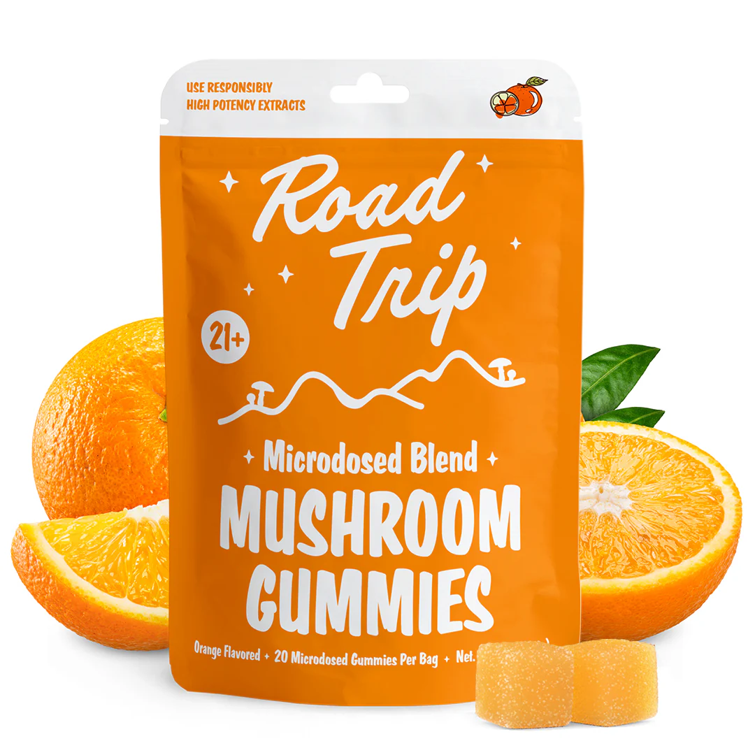 Front pouch of Microdose Road Trip Mushroom Gummies in Rocket Pop flavor. The packaging highlights “Desert Stardust,” functional mushroom blend, and dosing guide for microdosed use.